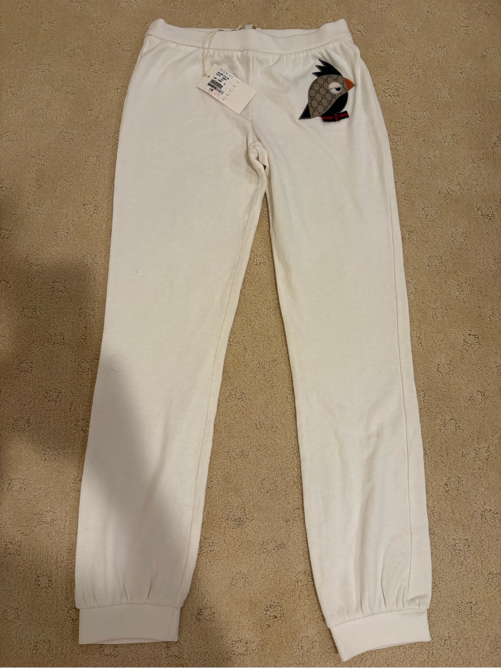 New with tags: Authentic Gucci Girls pants with logo Bird Patch